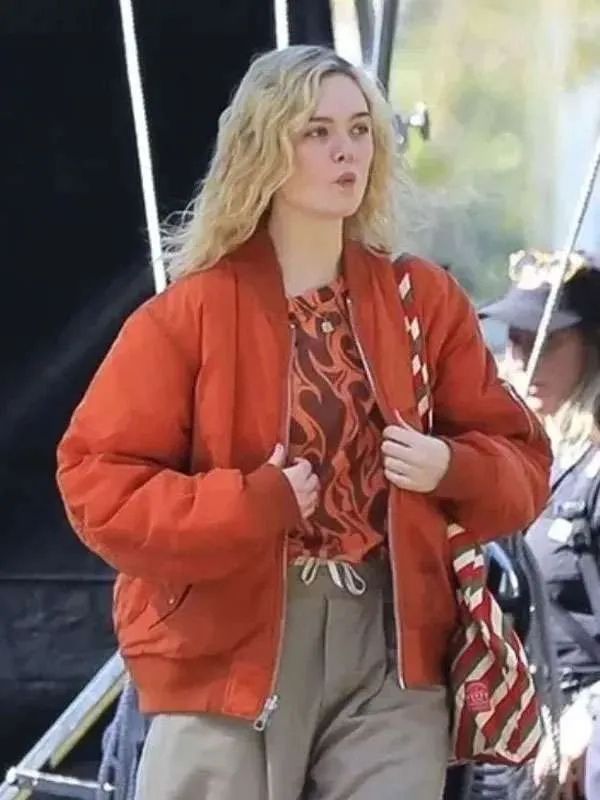 Margo’s Got Money Troubles Elle Fanning Orange Bomber Jacket