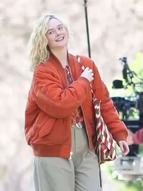 Margo’s Got Money Troubles Elle Fanning Orange Bomber Jacket